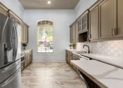 Thumbnail 5 of 34 - Grove Park Clubhouse Kitchen