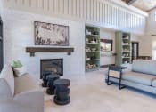 Thumbnail 4 of 43 - a living room with a couch and a fireplace