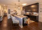 Thumbnail 26 of 43 - kitchen with island and chairs