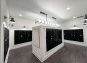 Thumbnail 20 of 21 - a wine tasting room with a wall of wine racks