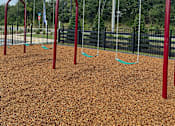 Thumbnail 56 of 71 - a swing set at a park