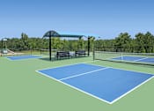Thumbnail 28 of 58 - a rendering of a tennis court with two benches