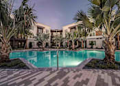 Thumbnail 1 of 47 - Resort-style swimming pool with lounge seating in Apollo Beach, and nearby areas