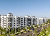 Thumbnail 21 of 22 - an aerial view of a large apartment complex with a clear blue sky in the background at Leena Plantation, Florida, 33322