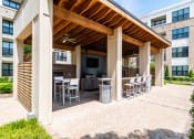 Thumbnail 42 of 49 - the preserve at ballantyne commons outdoor patio with seating and a grill
