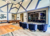 Thumbnail 6 of 49 - a large room with a pool table and a large mirror