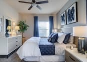 Thumbnail 9 of 44 - Bedroom With Expansive Windowsat Residence at Midland, Midland, TX, 79706