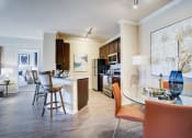 Thumbnail 14 of 44 - Dining Room and Kitchen View at Residence at Midland, Texas