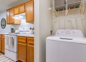Thumbnail 8 of 28 - a kitchen with a washer and dryer and a laundry room with wooden cabinets