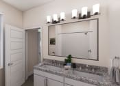 Thumbnail 17 of 29 - a bathroom with a large mirror and a sink