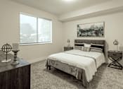 Thumbnail 22 of 30 - A bedroom with a large bed and a painting on the wall at Saba Pompano Beach, Pompano Beach, 33062