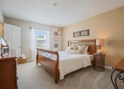 Thumbnail 7 of 25 - Model Bedroom