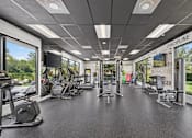 Thumbnail 29 of 35 - A gym with a sign that says "Discipline Training" on the wall.