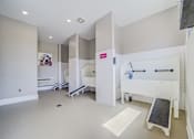 Thumbnail 19 of 53 - A room with a white sink and a white cabinet.