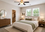 Thumbnail 22 of 71 - bedroom with big bed and dresser with natural light