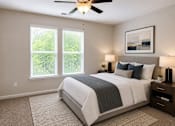 Thumbnail 14 of 71 - A bedroom with bed and painting with double window natural lighting