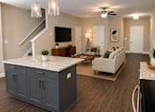 Thumbnail 19 of 71 - living room with sofa and console with mounted tv