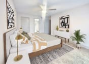 Thumbnail 11 of 27 - a bedroom with a large bed and a ceiling fan