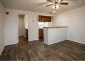 Thumbnail 15 of 16 - a kitchen and living room in a 555 waverly unit