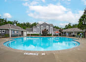 Thumbnail 26 of 29 - A large outdoor swimming pool with the words "Bank of America" on the ground.