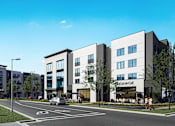 Thumbnail 2 of 5 - Dog-Friendly Luxury Apartments in Murfreesboro, TN - Vintage 1959 - Mixed-Use Community With Wide Sidewalks, Landscaped Green Spaces, Street-Level Retail, And Pedestrians.
