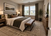 Thumbnail 41 of 56 - A bedroom with a large bed and a painting on the wall.