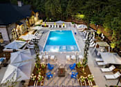 Thumbnail 1 of 50 - a view of the pool from a hotel at night