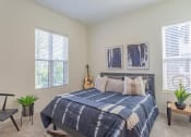 Thumbnail 12 of 18 - Apartments In Hermitage For Rent - Spacious Bedroom With High Ceiling, Plush Carpet Flooring, And Large Contemporary Windows With Blinds.