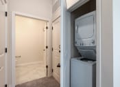 Thumbnail 13 of 19 - a small room with a tv and a closet