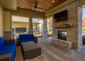 Thumbnail 23 of 30 - the preserve at ballantyne commons covered patio with fireplace and seating