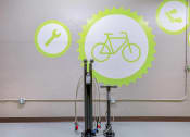 Thumbnail 19 of 20 - the wall is decorated with images of bicycles and tools