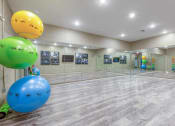 Thumbnail 15 of 20 - a large room with a ping pong table and a bunch of balloons