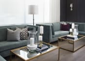 Thumbnail 6 of 44 - a living room filled with furniture and a large chandelier