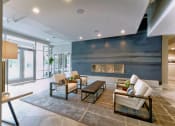 Thumbnail 14 of 31 - the preserve at ballantyne commons living room with a fireplace