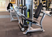 Thumbnail 24 of 31 - a row of exercise machines in a gym
