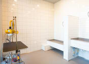 Thumbnail 39 of 47 - a bathroom with a shower and a sink and a bath tub