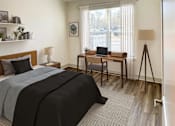 Thumbnail 11 of 70 - A bedroom with a bed, desk, and chair.