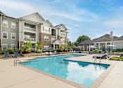 Thumbnail 12 of 30 - the preserve at ballantyne commons pool and apartment buildings