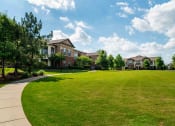 Thumbnail 33 of 36 - a large lawn in front of a building