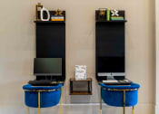 Thumbnail 8 of 36 - a room with two monitors and a computer on a table