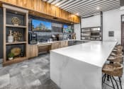 Thumbnail 6 of 48 - the kitchen has a large island with a marble counter top