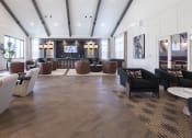 Thumbnail 5 of 21 - the lobby of a hotel with couches and chairs