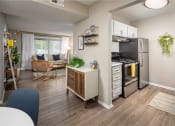Thumbnail 12 of 31 - our apartments offer a living room with a couch and a coffee table at Waterview at Rocky Point, Florida