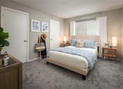 Thumbnail 22 of 31 - a bedroom with a bed and two nightstands  at Waterview at Rocky Point, Tampa