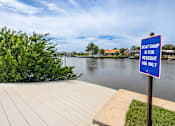 Thumbnail 17 of 22 - A sign on a boat ramp states that it is for resident use only.