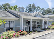 Thumbnail 33 of 36 - A building with a porch and a sign that reads 500.