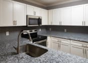 Thumbnail 23 of 32 - Whisperwood Kitchen Granite Level Upgrade