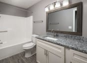 Thumbnail 25 of 32 - Whisperwood Granite Finish Bathroom