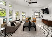 Thumbnail 20 of 30 - A black and white checkered floor in a living room.