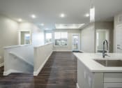 Thumbnail 14 of 50 - White kitchen gallery at Icon Apartment Homes at Ferguson Farm, Bozeman, MT